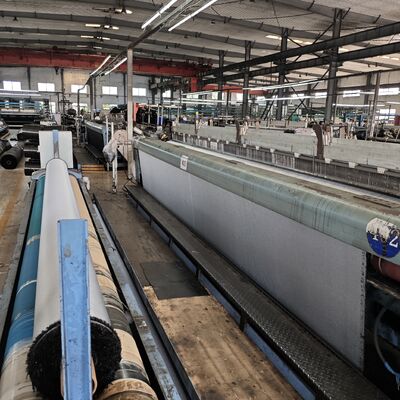 Industrial Woven Geotextile Fabric Designed To Prevent Soil Erosion And Aggregate Displacement In Infrastructure Applications